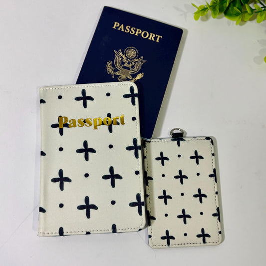 A passport and a passport holder are placed on a white surface, along with a small white tag.
