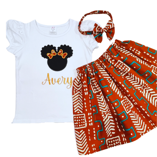 Girls' African print fabric skirt set with a personalized embroidered t-shirt and a matching headband